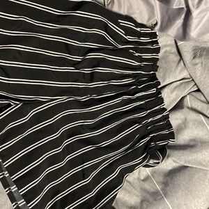 Black and white polyester shorts.